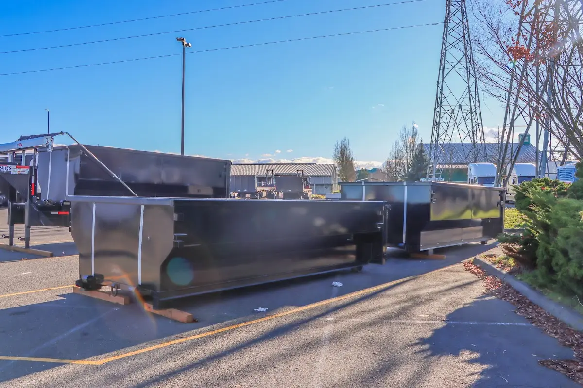 Roll-off dumpster ready for waste disposal at job site for Concrete Dumpster Rental in Canal Fulton